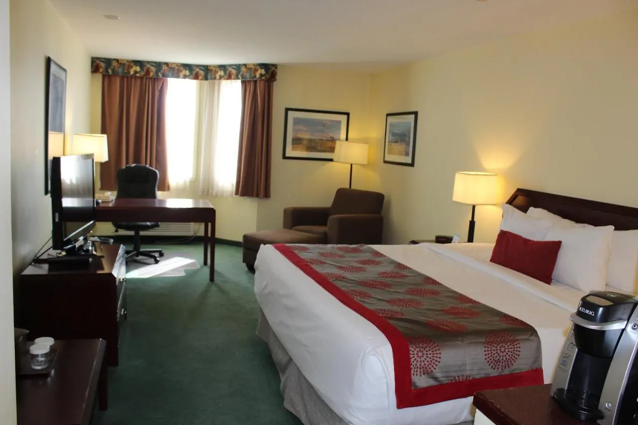Отель Divya Sutra Plaza And Conference Centre Calgary Airport